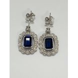 14ct White Gold Sapphire and Diamond earrings featuring, 2 cushion cut, blue Sapphires (2.24ct TSW),