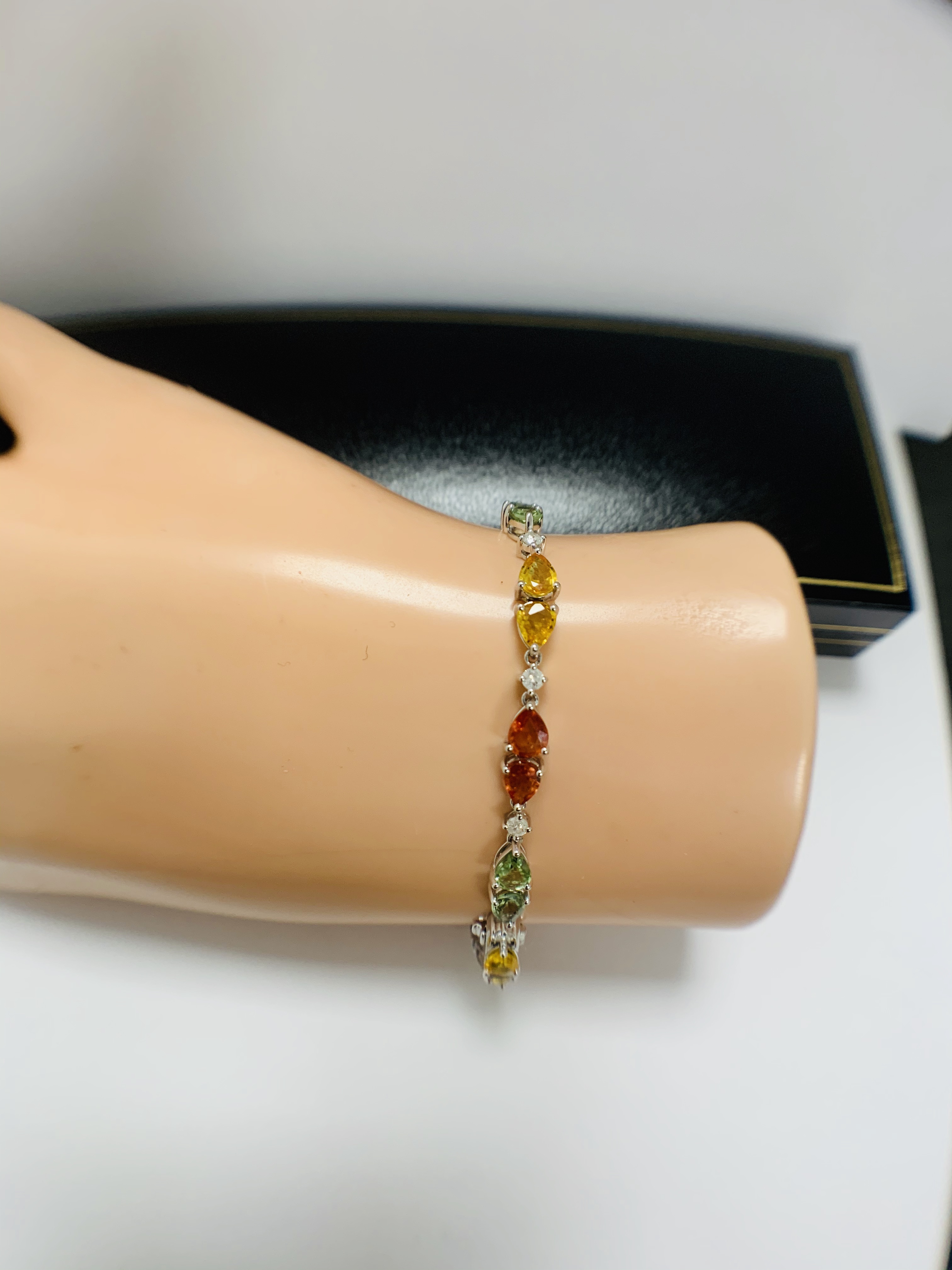 14ct White Gold Sapphire and Diamond bracelet featuring, 22 pear cut, yellow, green and orange Sapph - Image 23 of 24