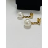 14ct Yellow Gold Pearl and Diamond earrings featuring, 2 white Pearls, with 8 round brilliant cut Di