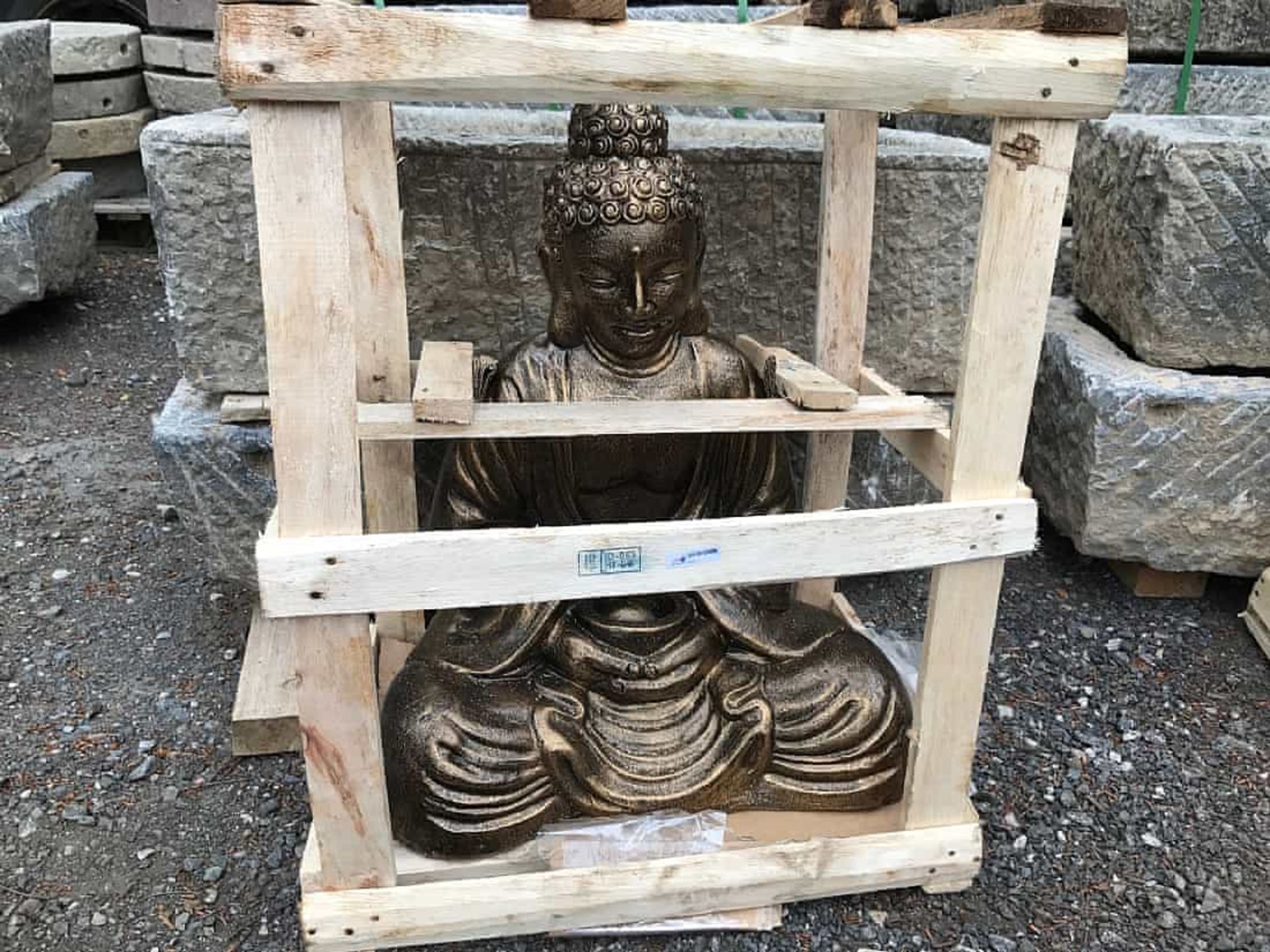 CRATED HANDFIRED TERRECOTTA BUDDHA SITTING IN BRONZE