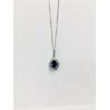 18Ct White Gold Sapphire And Diamond Pendant,