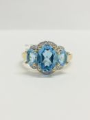9ct yellow gold Blue Topaz and diamond ring
