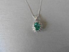 0.80Ct Emerald And Diamond Cluster Style Pendant.