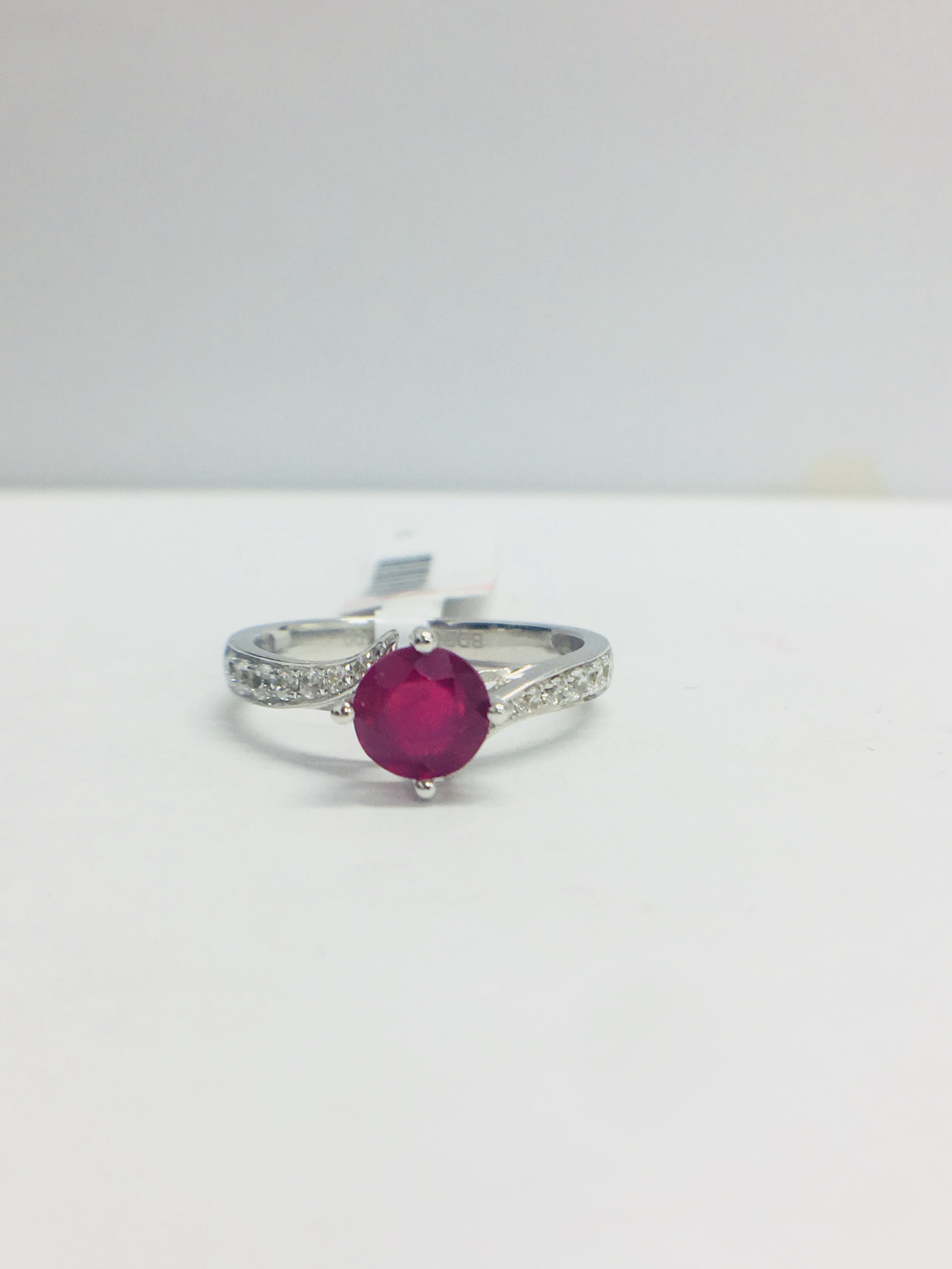 Platinum Ruby Diamond Solitaire Style Ring,