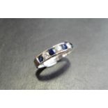 Sapphire And Diamond Eternity Band Ring Set In 9Ct White Gold.