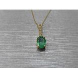 0.80Ct Emerald And Diamond Drop Style Pendant.