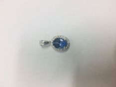 14Ct White Gold Tanzanite & Diamond Pendant.