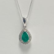 9ct white gold Emerald diamond pendant and chain