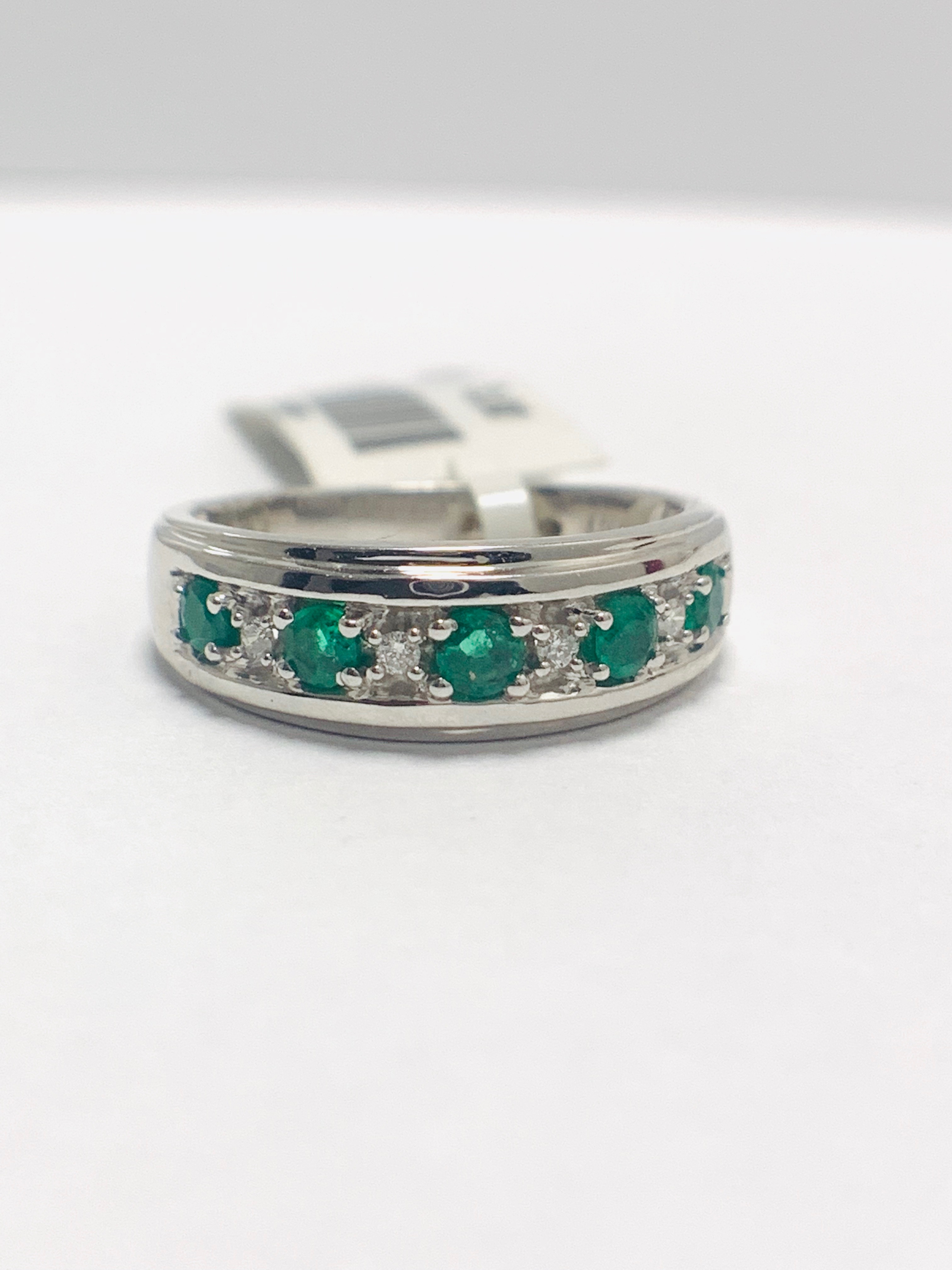 9ct white gold emerald diamond band ring.