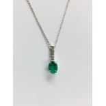 0.80Ct Emerald And Diamond Drop Style Pendant.