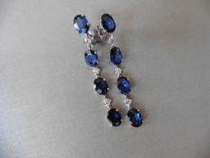 Sapphire And Diamond Drop Style Earrings Set In 18Ct Gold.