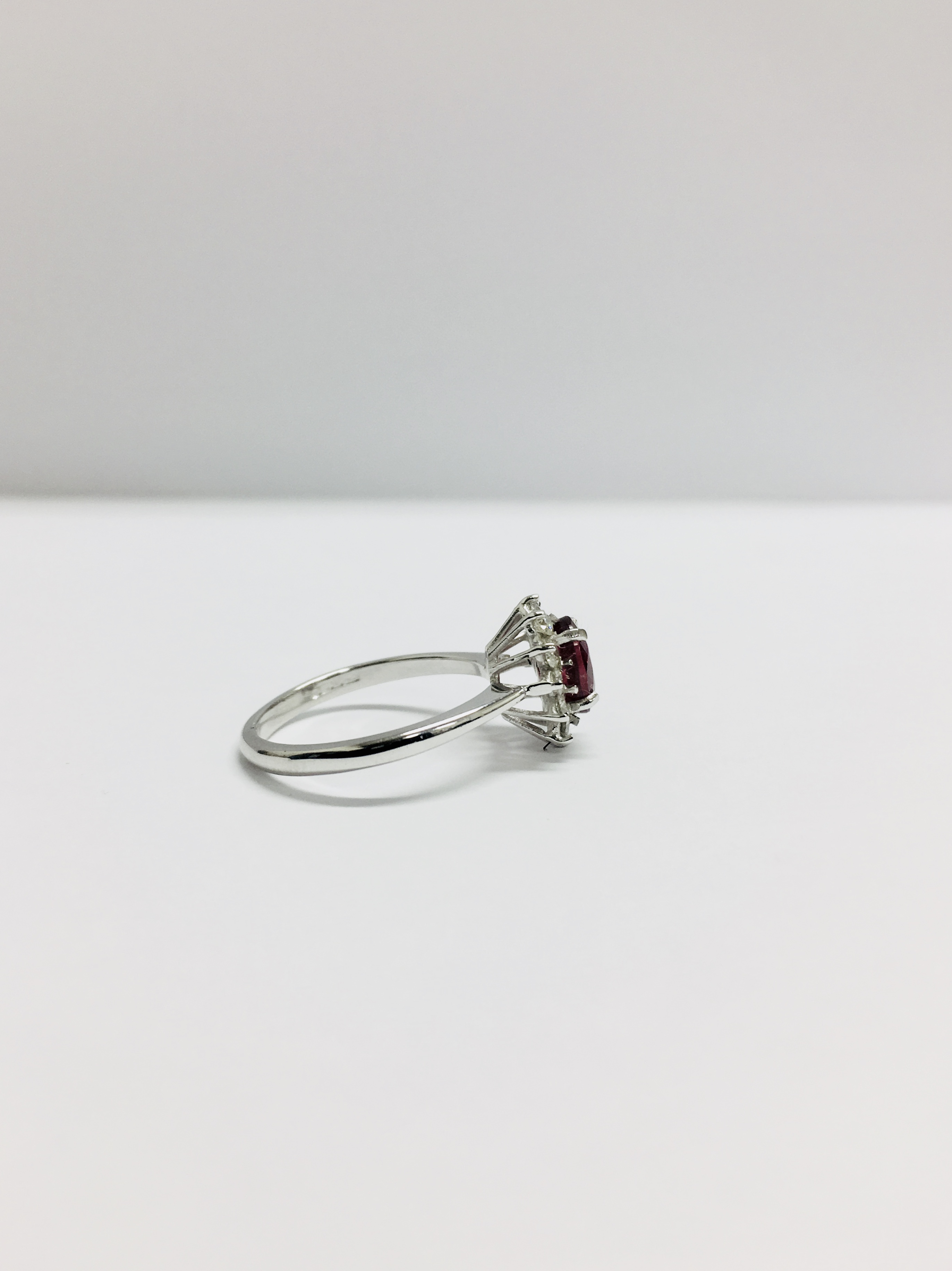 0.80Ct Ruby And Diamond Cluster Ring Set With A Oval Cut(Glass Filled) Ruby - Image 6 of 9