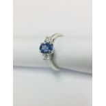 Platinum Tanzanite Diamond Trilogy Ring,