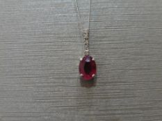 0.80Ct Ruby And Diamond Drop Style Pendant.