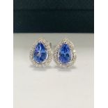 9Ct White Tanzanite Diamond Stud Earrings .