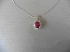 0.80Ct Ruby And Diamond Cluster Style Pendant.