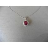 0.80Ct Ruby And Diamond Cluster Style Pendant.