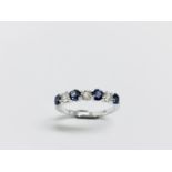 0.40Ct Sapphire And Diamond Eternity Style Ring.