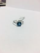 9Ct White Gold Blue Topaz And Diamond Ring,