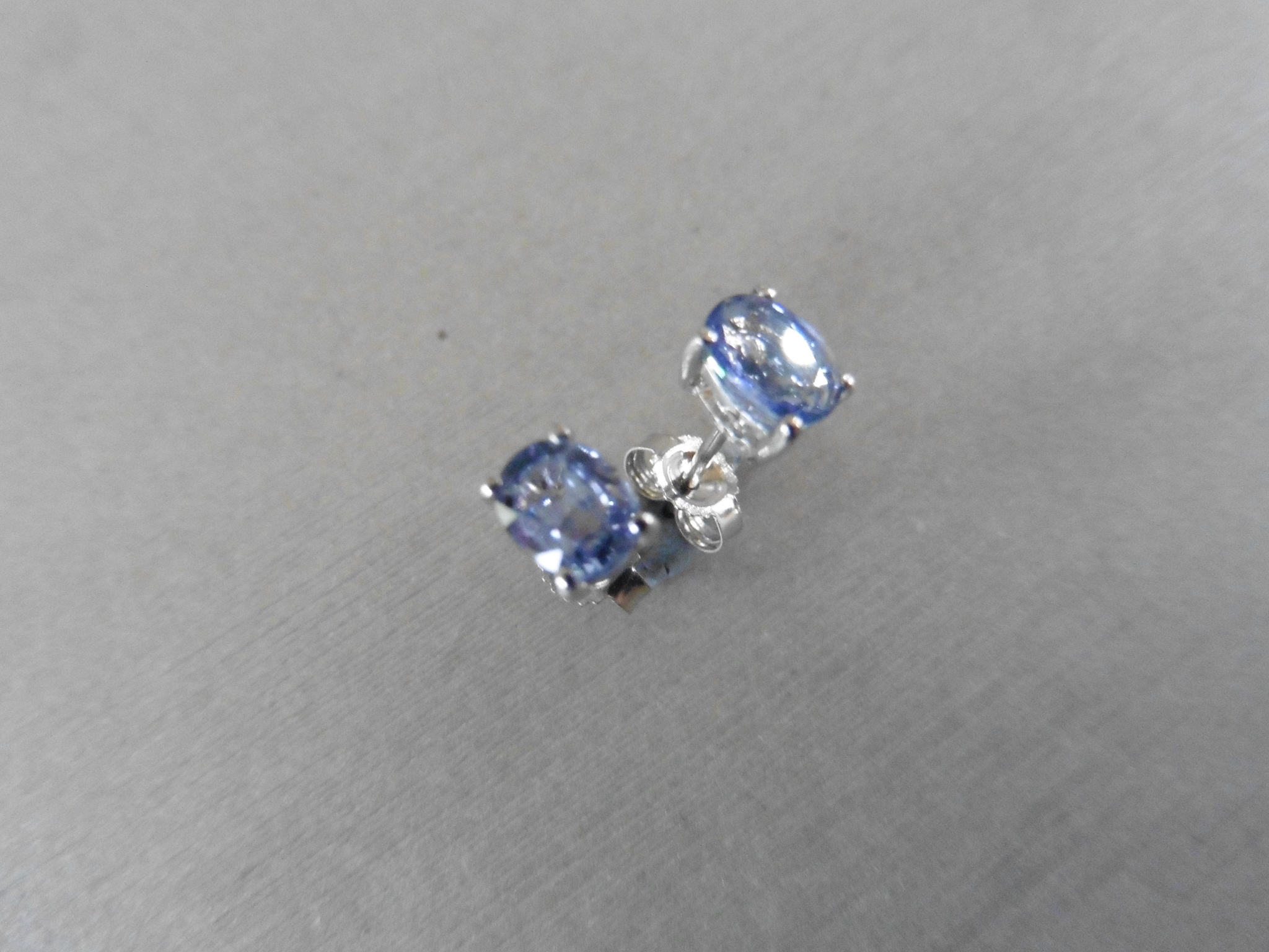 0.60Ct Ceylon Sapphire Stud Style Earrings Set In 9Ct White Gold.