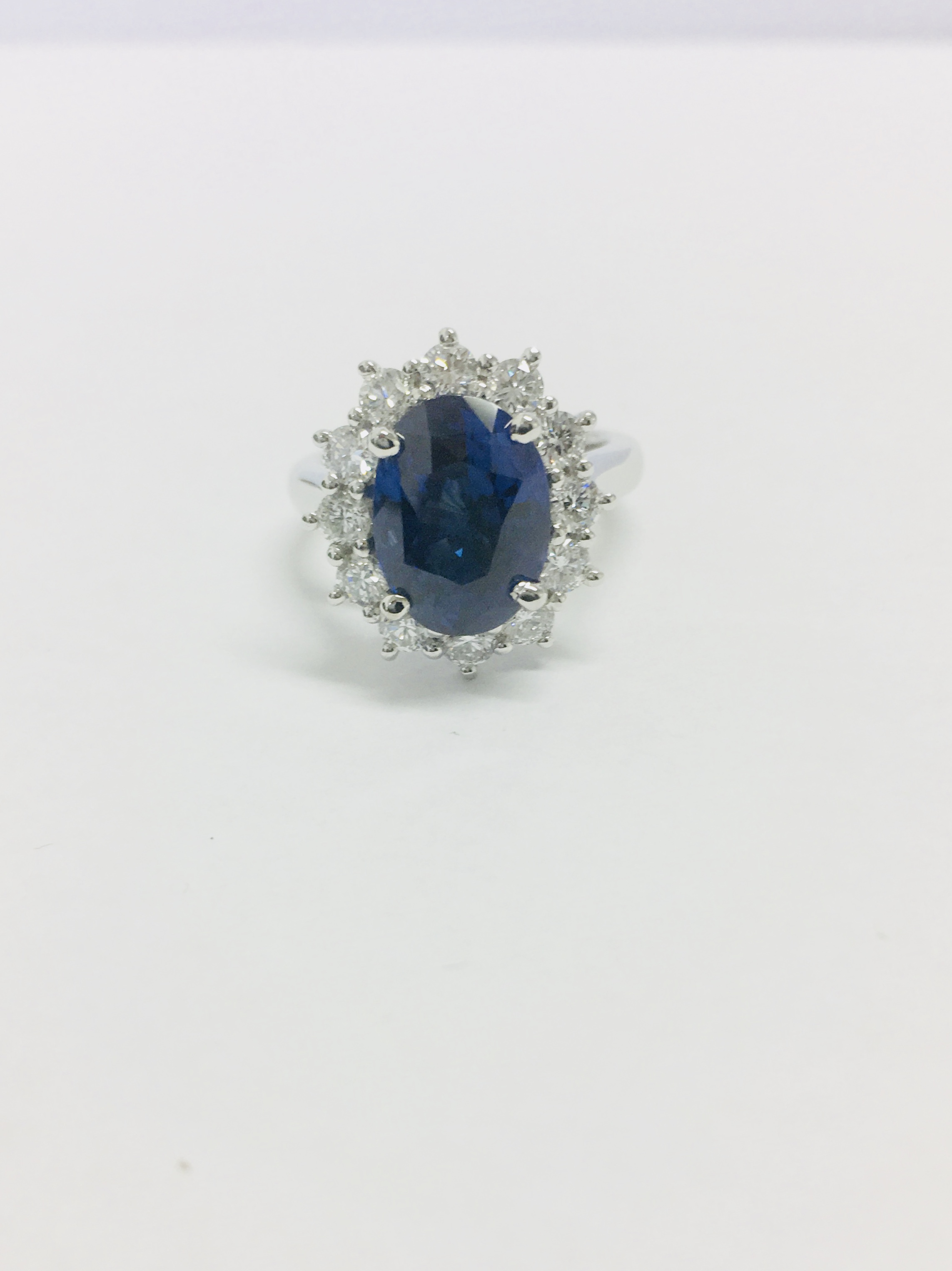 18Ct White Gold Sapphire And Diamond Cluster Ring,