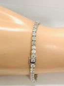 14ct White Gold Diamond tennis bracelet featuring, 44 round brilliant cut Diamonds