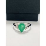 14ct White Gold Emerald and Diamond ring featuring centre, pear cut, medium green Emerald (1.00ct),