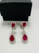 14ct White Gold Ruby and Diamond drop earrings featuring, 4 pear cut, deep pinkish red Rubies (2.68c