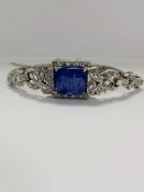 14ct White Gold Tanzanite and Diamond bracelet featuring, oval cut Tanzanite (8.08ct), cclaw set, wi