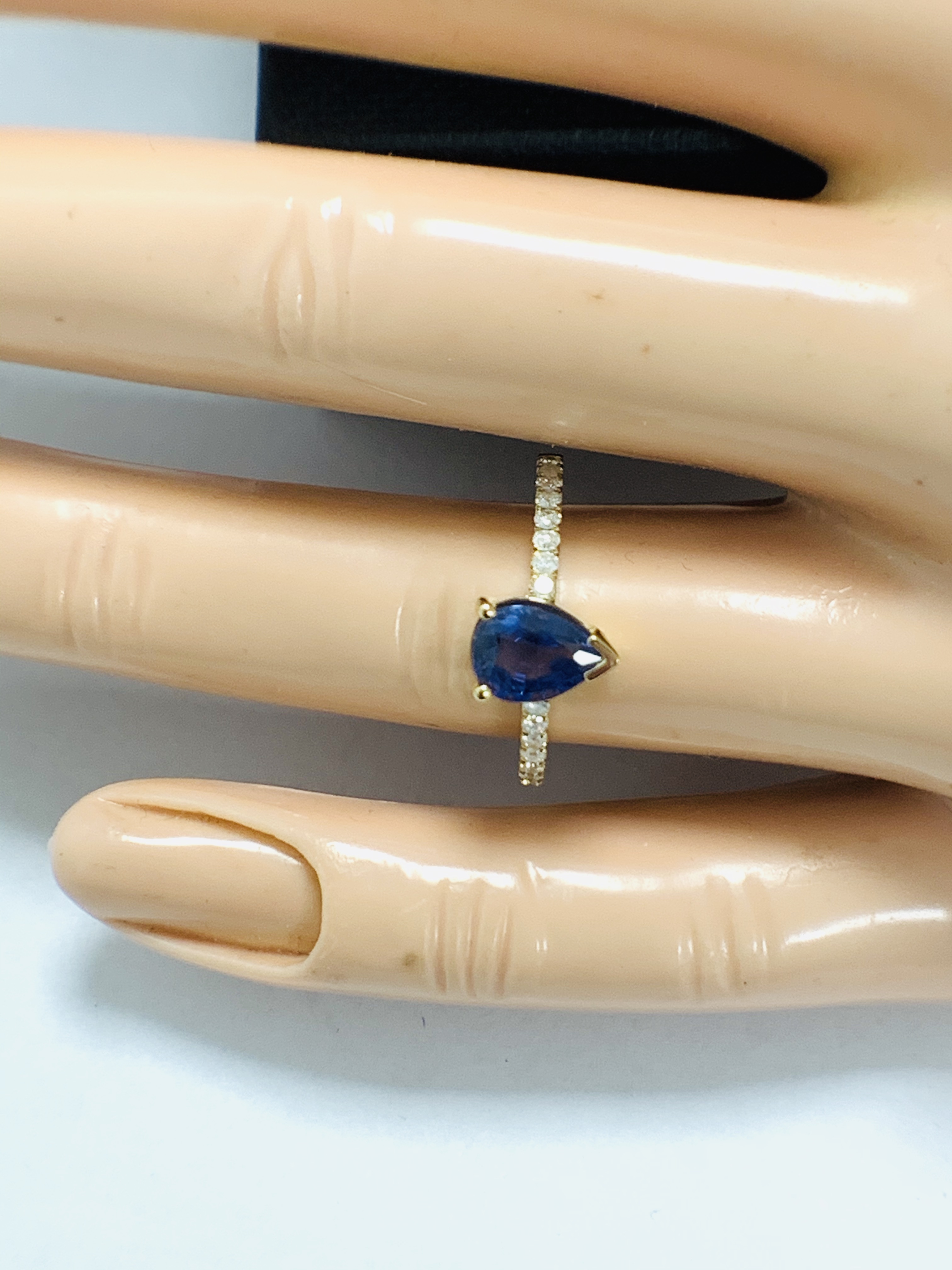 14ct Yellow Gold Sapphire and Diamond ring featuring centre, pear cut, medium blue Sapphire (1.01ct) - Image 10 of 12