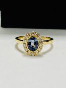 14ct yellow gold sapphire and diamond ring.