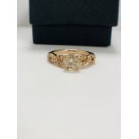 14ct Rose Gold Diamond ring featuring centre, champagne Diamond (1.00ct), claw set, with 24 round br