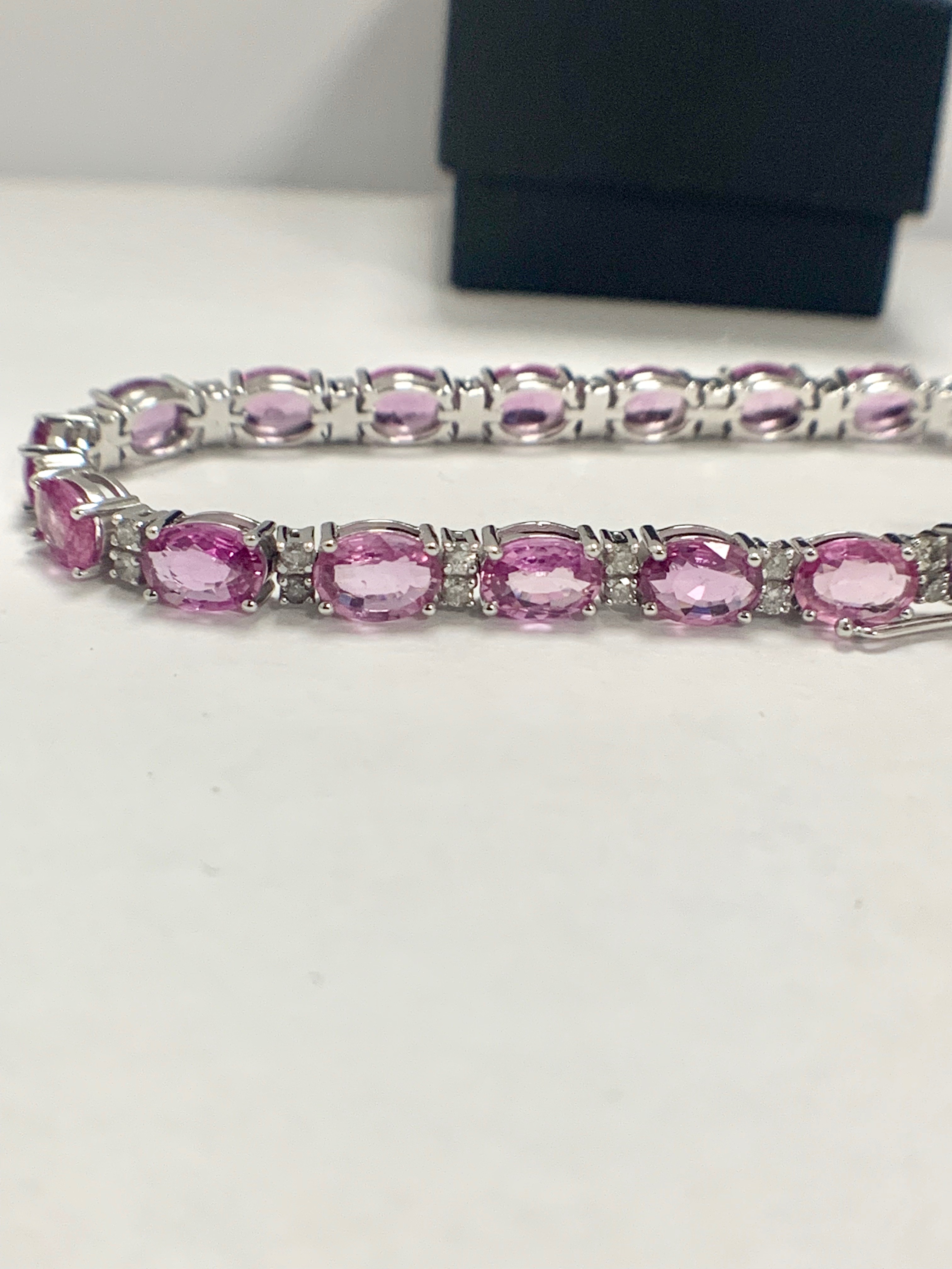 14ct White Gold Sapphire and Diamond bracelet featuring, 19 oval cut, pink Sapphires (15.93ct TSW) - Image 7 of 11