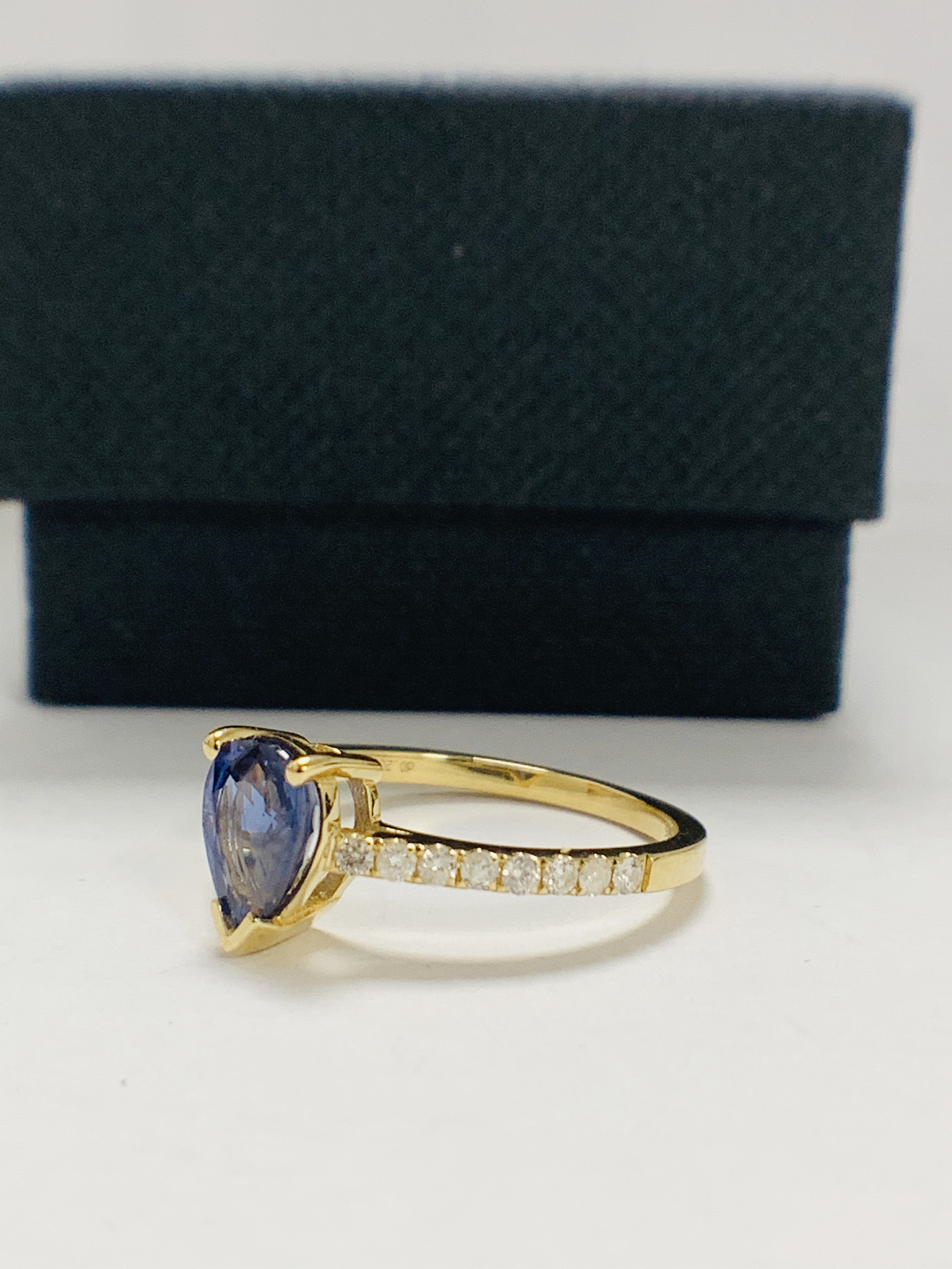 14ct Yellow Gold Sapphire and Diamond ring featuring centre, pear cut, medium blue Sapphire (1.01ct) - Image 2 of 12