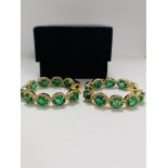 14ct Yellow Gold Emerald and Diamond hoop earrings featuring, 18 oval cut, medium to dark green Emer