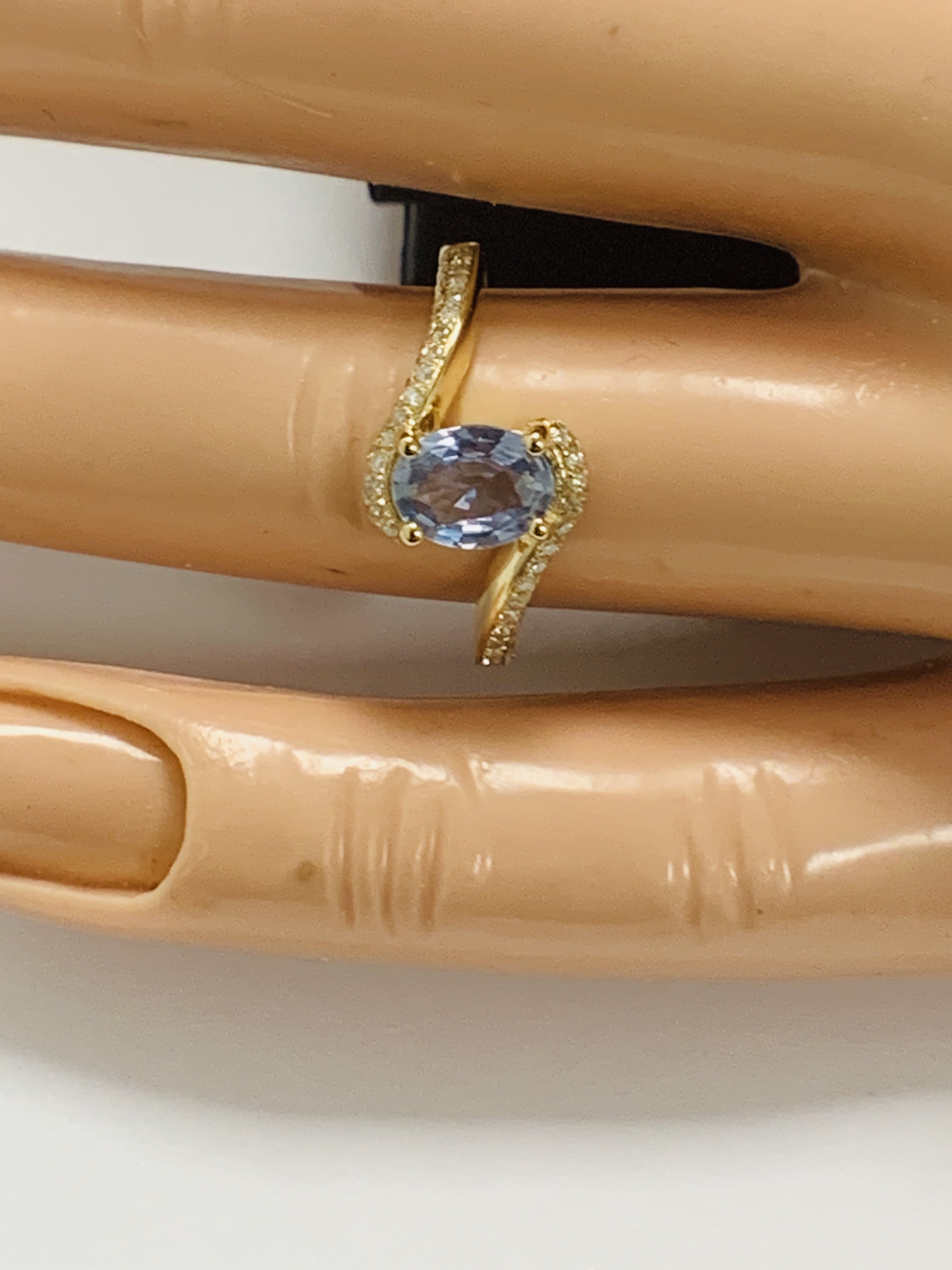 14ct Yellow Gold Sapphire and Diamond ring featuring centre, oval cut, light blue Sapphire (0.77ct), - Image 8 of 10
