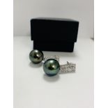 14ct Yellow Gold Pearl and Diamond drop earrings featuring, 2 grey South Sea Pearls, with 44 round b