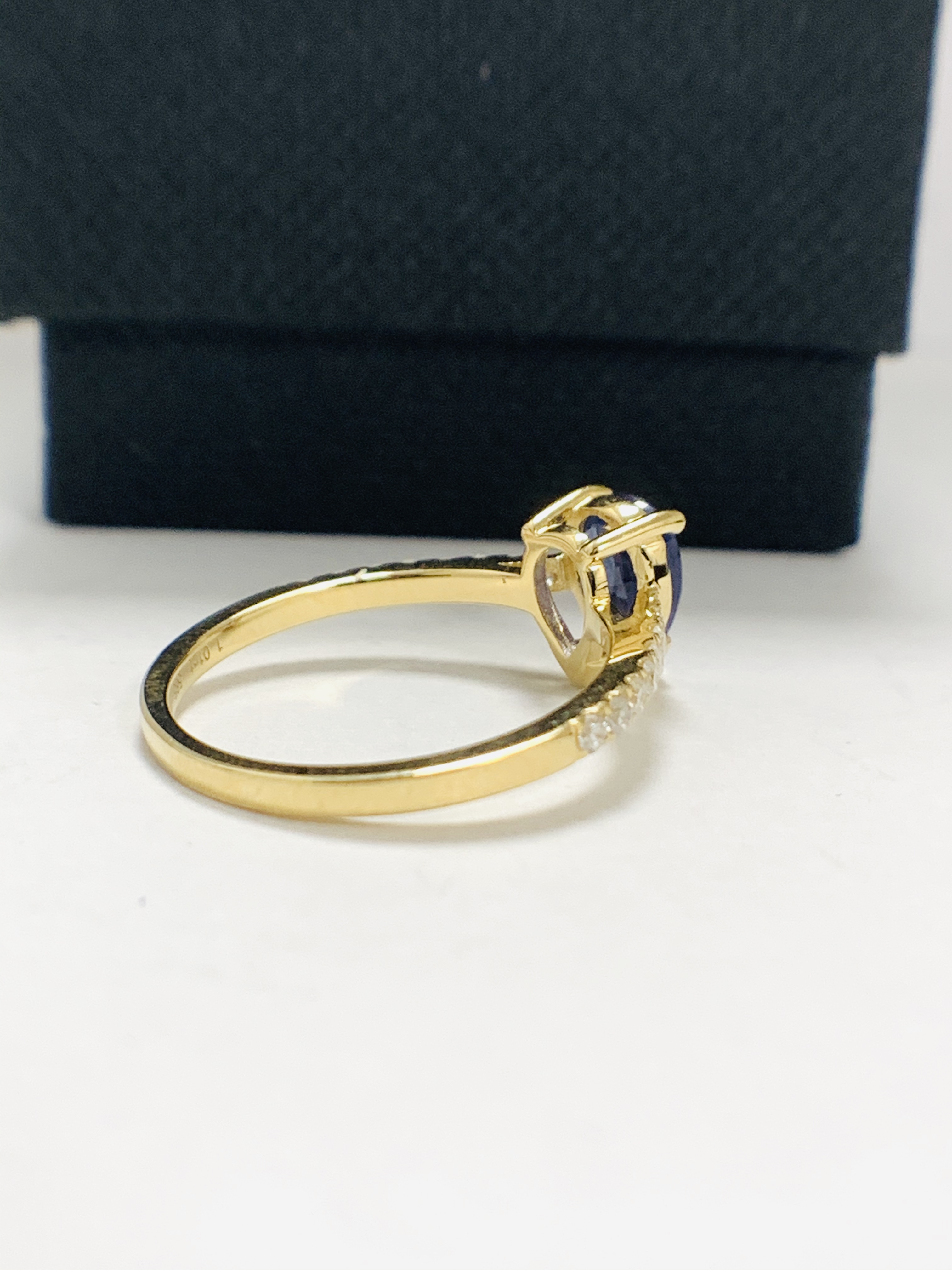 14ct Yellow Gold Sapphire and Diamond ring featuring centre, pear cut, medium blue Sapphire (1.01ct) - Image 5 of 12