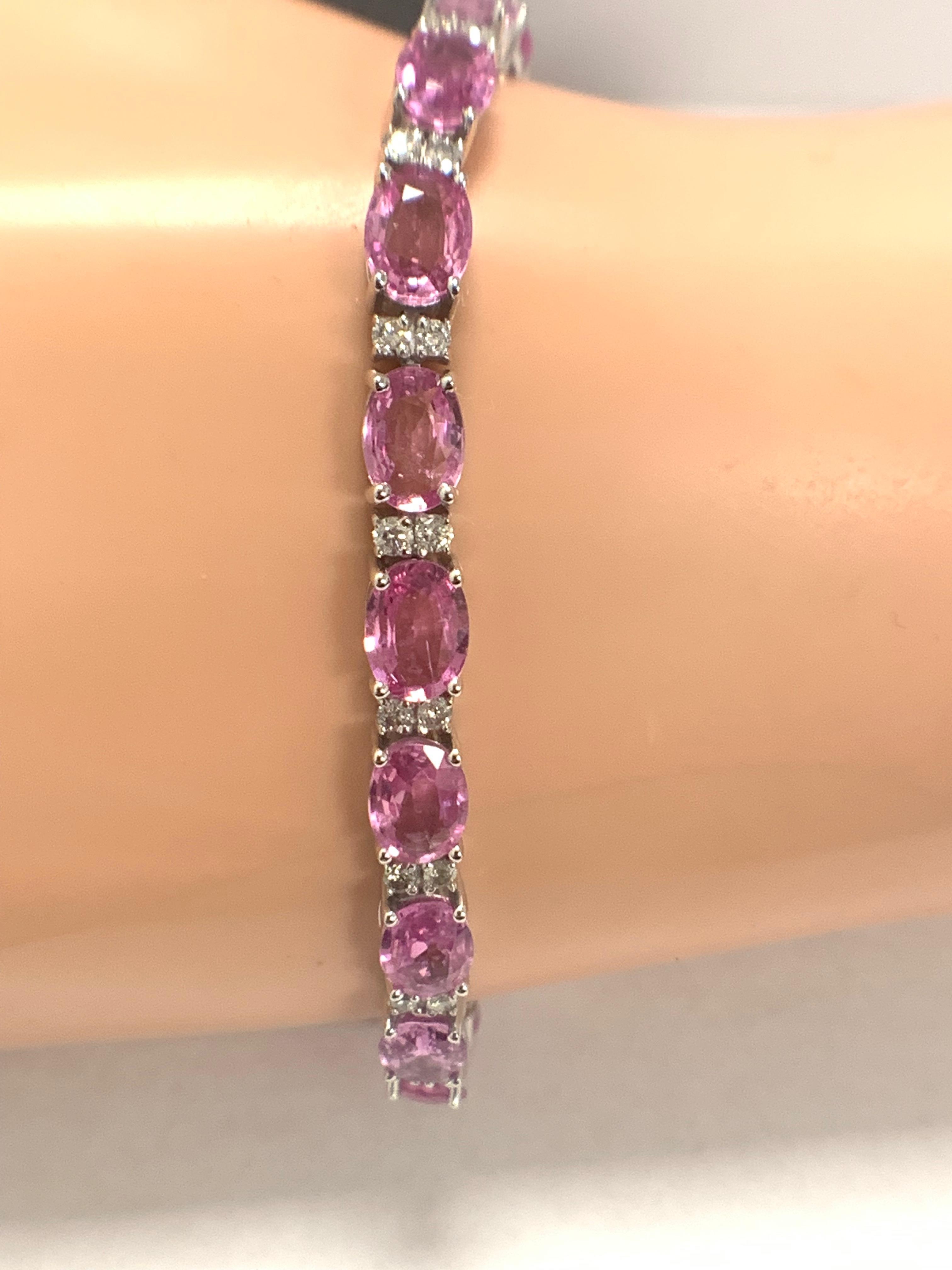 14ct White Gold Sapphire and Diamond bracelet featuring, 19 oval cut, pink Sapphires (15.93ct TSW) - Image 9 of 11