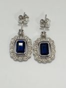 14ct White Gold Sapphire and Diamond earrings featuring, 2 cushion cut, blue Sapphires (2.24ct TSW),