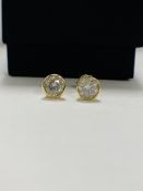 14ct Yellow Gold Diamond stud earrings featuring, 2 round brilliant cut Diamonds (1.01ct TDW), bezel