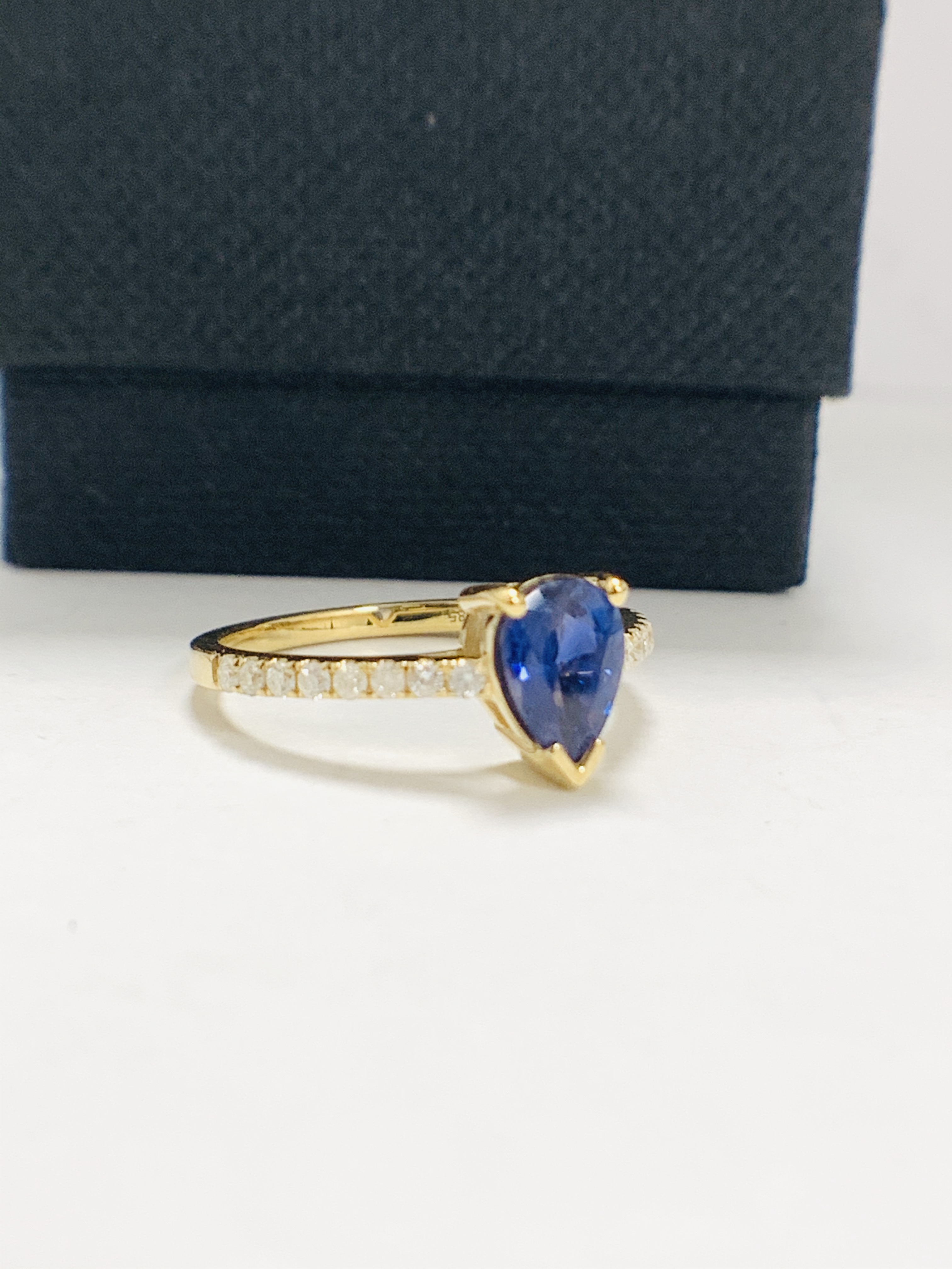 14ct Yellow Gold Sapphire and Diamond ring featuring centre, pear cut, medium blue Sapphire (1.01ct) - Image 8 of 12