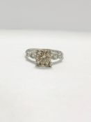 Platinum Diamond ring featuring centre, round brilliant cut, fancy light brown Diamond (1.55ct)