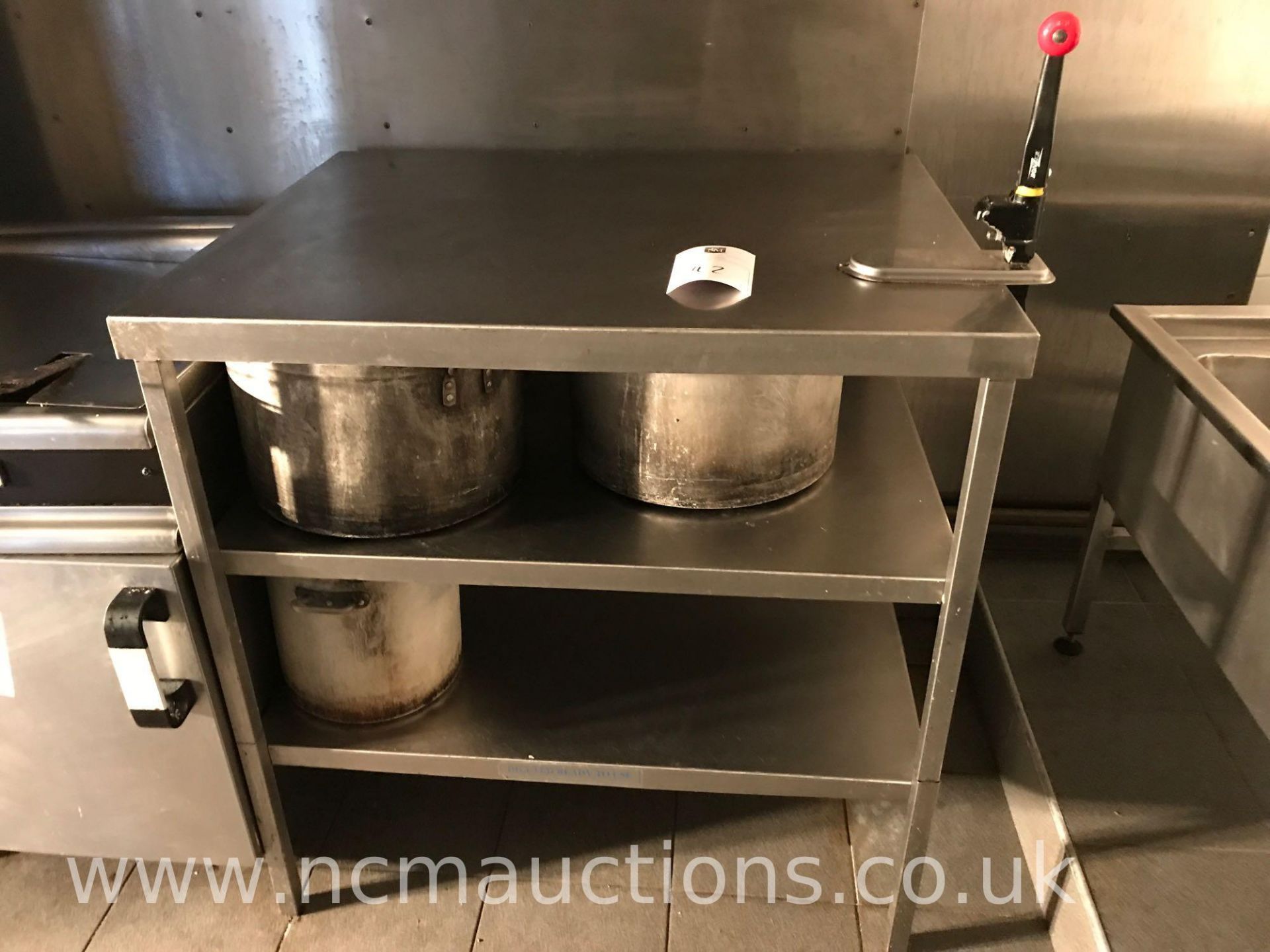 Stainless steel counter with under shelving