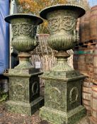 2.8M HIGH HUGE PAIR EXCEPTIONAL CAST IRON MONUMENTAL CAMPANA STYLE URNS ON PLINTH, IN THE MANNER OF