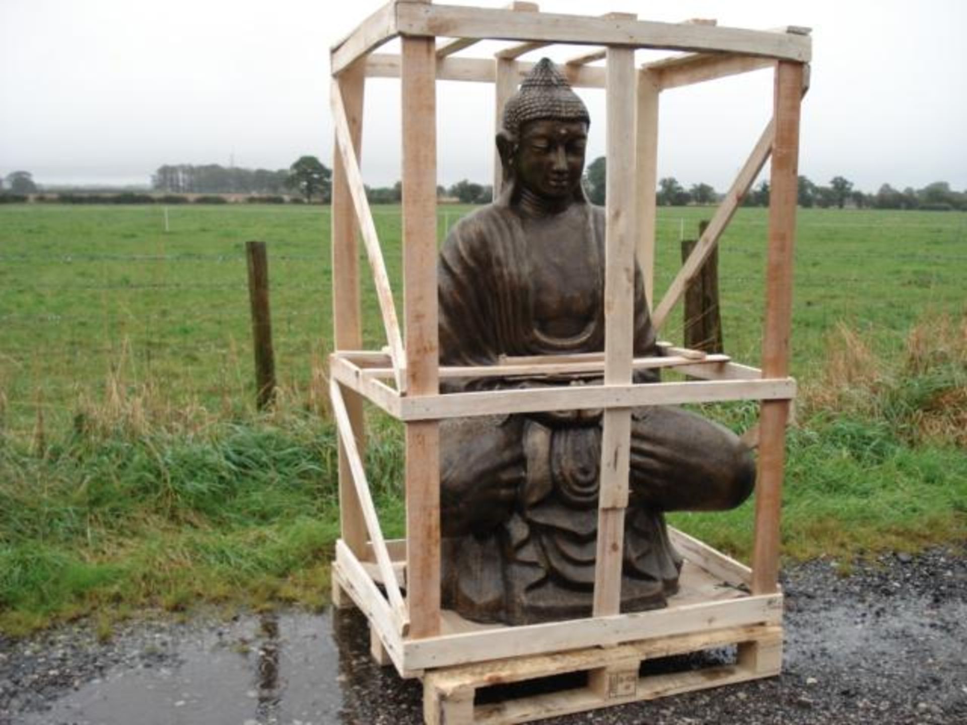 MASSIVE CRATED BUDDHA IN BRONZE FINISH ON PALLET