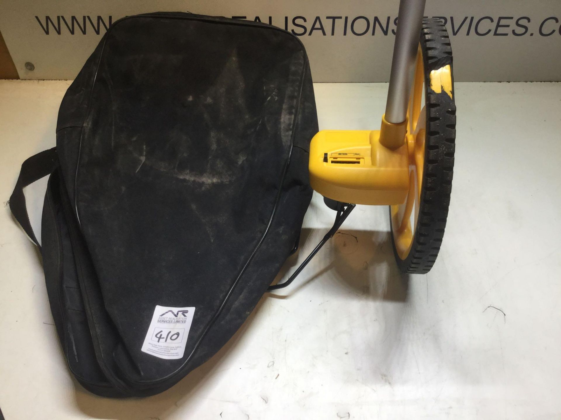 Measuring wheel in bag