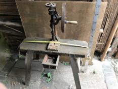 Hand opperated Pedestal Drop Drill on wooden bench