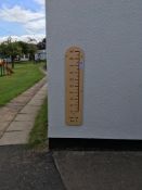 Wall mounted all weather plastic measuring stick