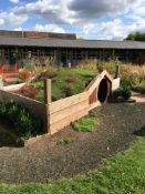 Bespoke timber frame crawling tunnel with artificial grass roof and flower beds, 4200x2200mm max.